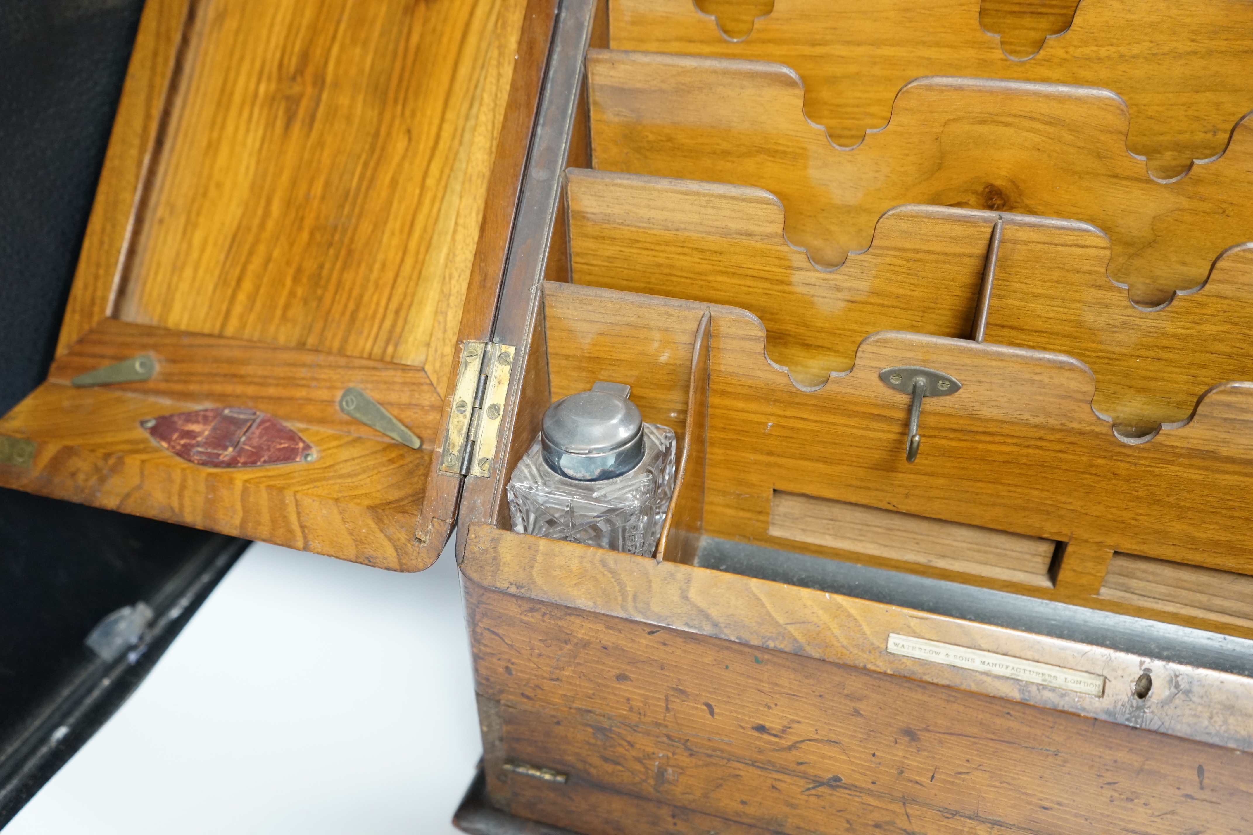 A Victorian walnut stationery box with pull out writing slope, ivory labels, 41cm wide CITES Submission reference PHGK9A82